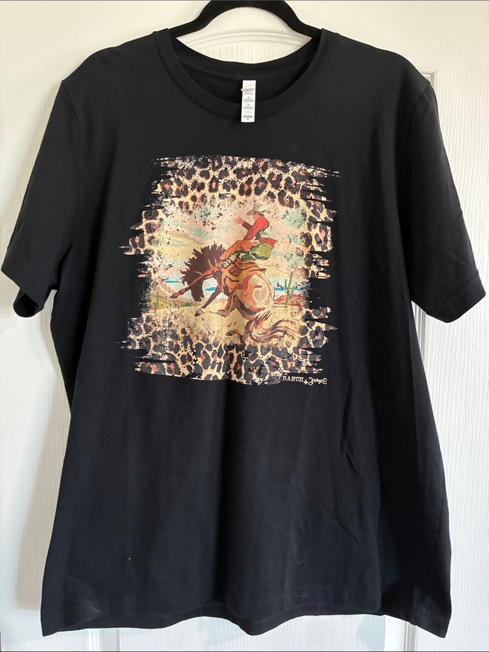 Bella Canvas Black Short-Sleeve Tee with Rodeo Cowboy Graphic
